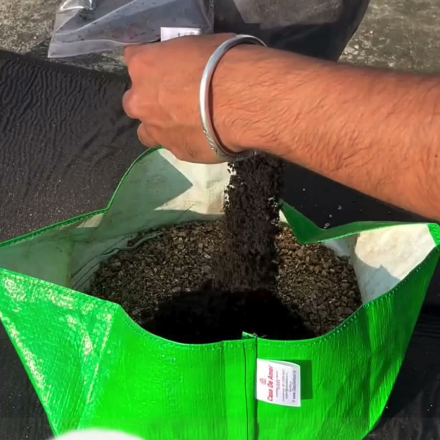 A bag of Shakti Agro vermicompost being packed for dispatch